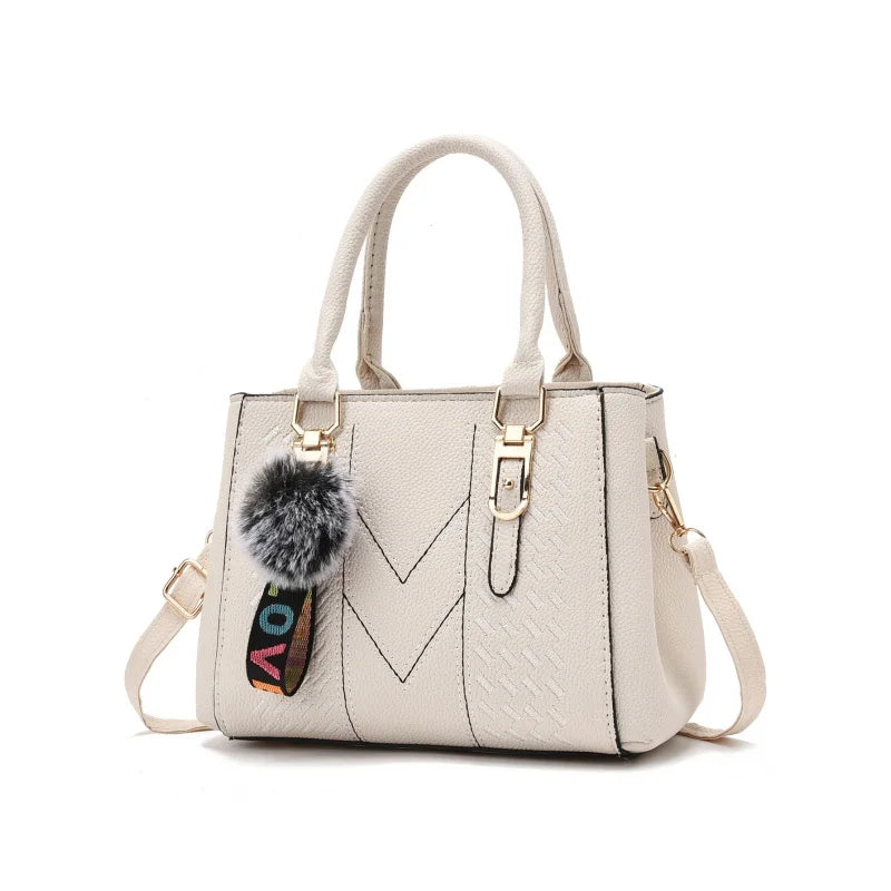 Embroidered Pom-Pom Pendant Handbag