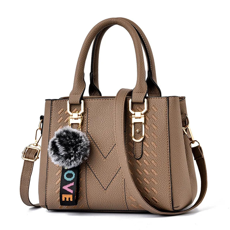 Embroidered Pom-Pom Pendant Handbag