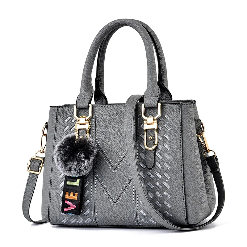 Embroidered Pom-Pom Pendant Handbag
