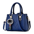 Embroidered Pom-Pom Pendant Handbag